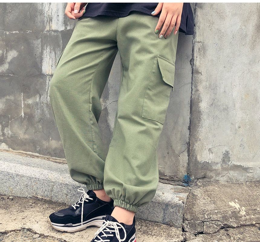 nike skinny joggers in sage green